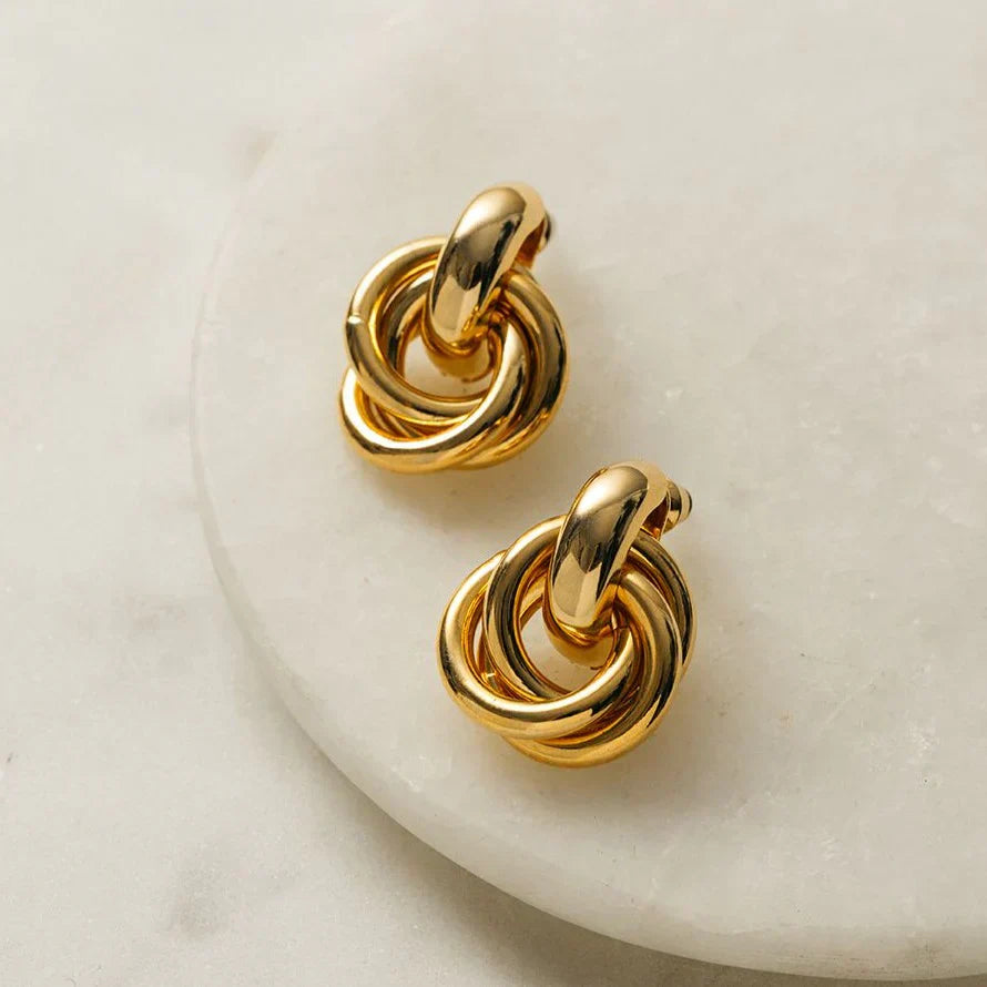 Statement sammenflettede øreringe | Guld