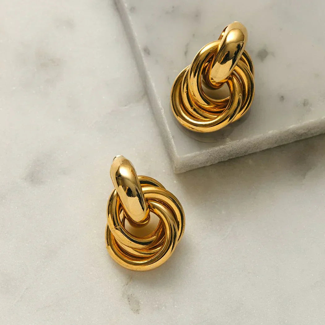Statement sammenflettede øreringe | Guld